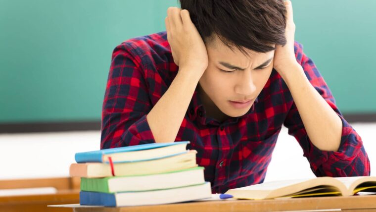 boy Student Avoid Distractions While Studying